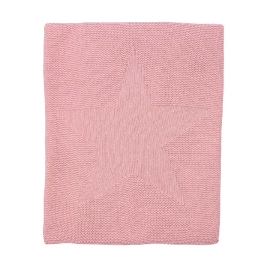 Close up showing the texture and fabric of the blush pink blanket