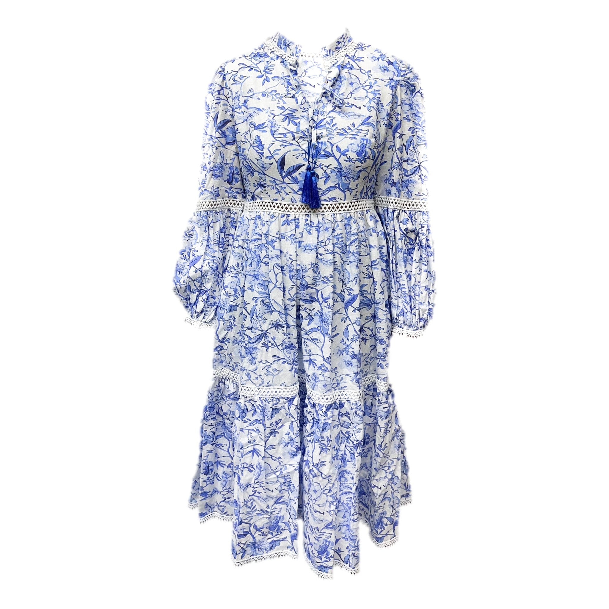 Blue and white floral print mom dress with lace inserts, long puff sleeves, criss cross bodice ties, tassel detail, and ankle length silhouette.