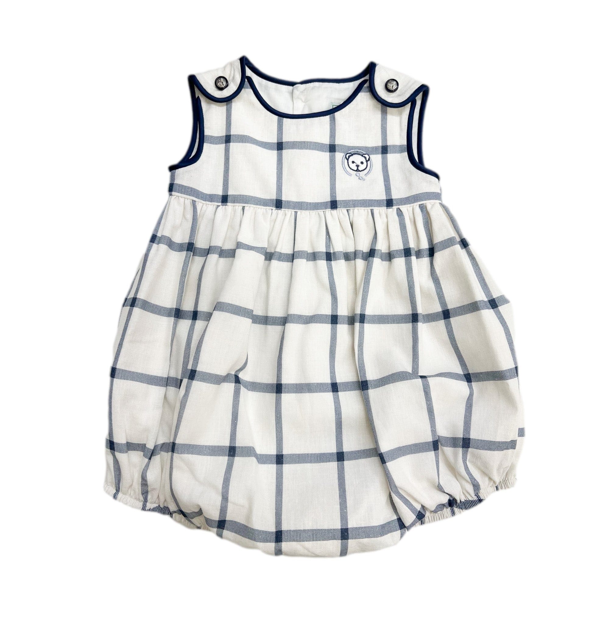 Checkered linen baby boy romper in ivory and navy with satin trim and nautical buttons. Breathable and perfect for everyday wear.