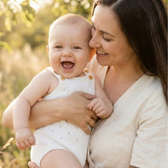 Emi White Knit Romper with Openwork Design