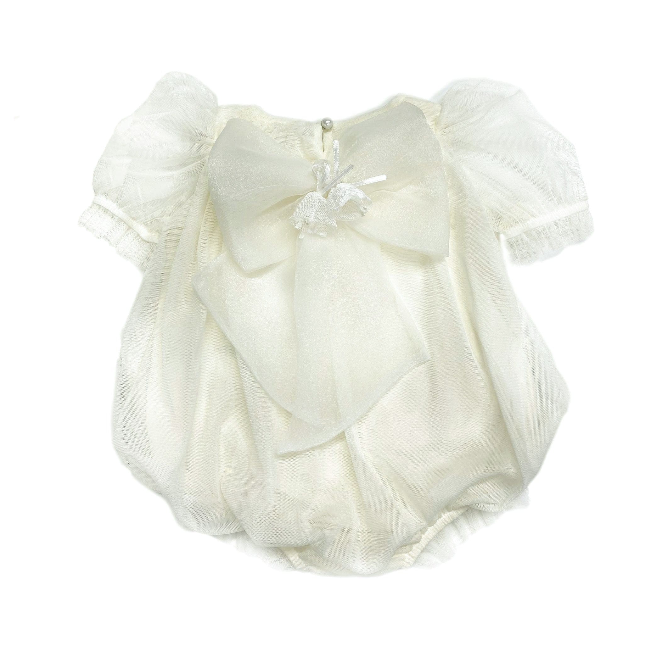 Bella ivory tulle baby romper with smocked front, faux pearl detail, organza bow with bell accents, and sheer tulle sleeves.