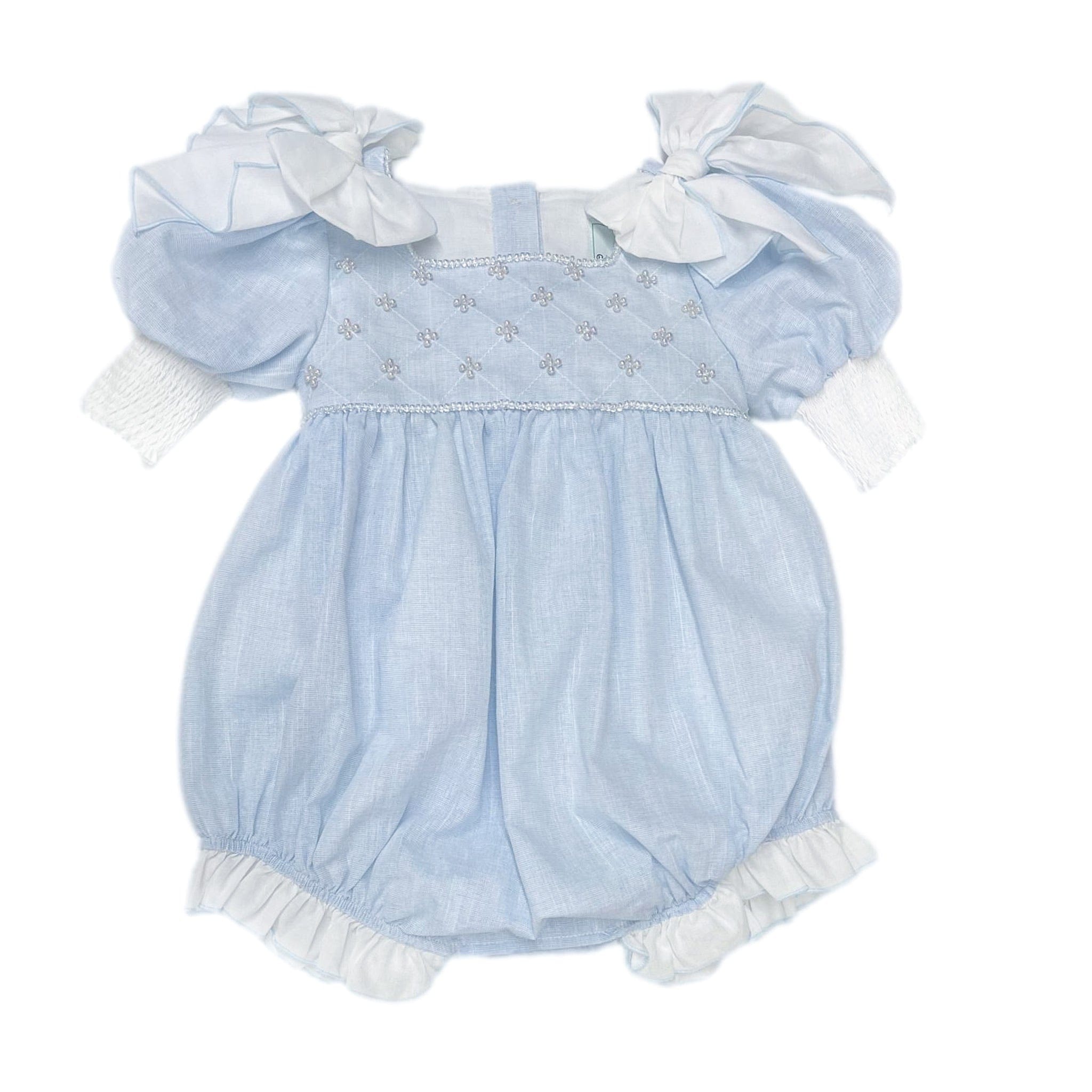 Charlotte baby blue linen romper with faux pearl hand beading, white shoulder bows, large back tie bow, and cotton lining.