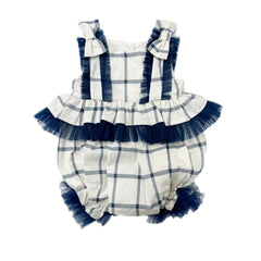 Checkered linen romper in ivory and navy with tulle ruffle trim and rhinestone buttons. Lightweight and perfect for special occasions.
