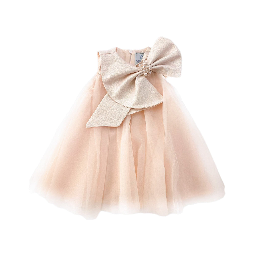 Peach layered tulle dress with jacquard bow, rhinestones, and pearl detail. Perfect for birthdays, Easter, weddings, and special occasions.